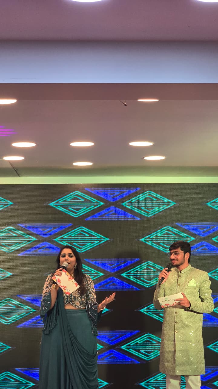 Anchor presenting at a live event